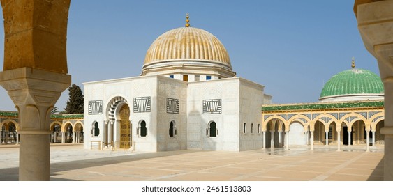 Scenic view of Habib Bourguiba Mausoleum in Tunisian city of Monastir with green and gold domes 