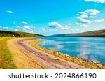 Scenic view of Hemlock Lake, one of the minor Finger Lakes. It is mostly located in Livingston County, New York, south of Rochester. It’s forever-wild, tranquil landscape the perfect place to unwind
