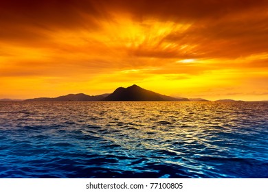 Scenic view of island during sunset