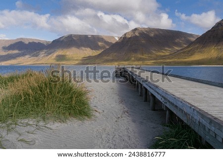 Scenic view of jetty, fjord and mountains in Westfjords, Iceland