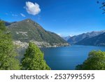 Scenic view of Lake Como, Italy and its southwestern branch looking north with Laglio (left) and Pognana Lario (right) against blue sky