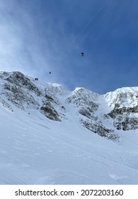 Scenic View Of Lift Above The Big Coulouir On Lone Peak At Big Sky Ski Resort In Montana On A Winter Day