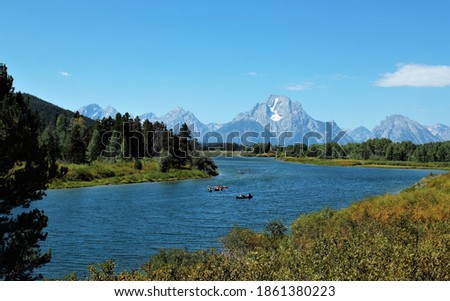 Scenic view of mighty Grand Teton mountains and Snake River