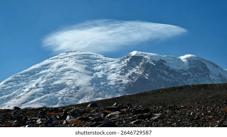 Scenic View of Mount Rainier with Cloud Formation Above the Summit