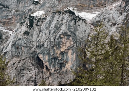 A scenic view of a mountain resembling a human face known as Heathen Maiden in the Alps in Slovenia