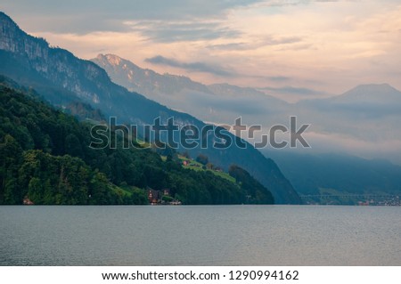 Scenic view of mountains over Lucerne Lake (Vierwaldstattersee) under picturesque sky, Canton of Uri, Switzerland. 'Lake of the Four Forested Settlements' - popular tourist attraction Imagine de stoc © 