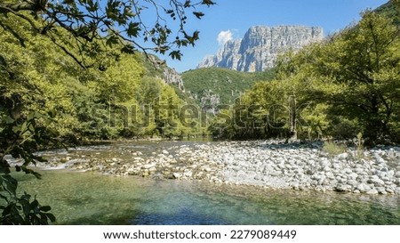 Scenic view of natural beauty of Voidomatis Vikos river Epirus Greece near to National park Vikos Gorge.