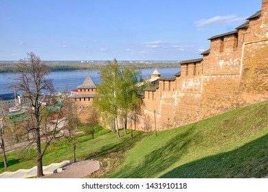 Scenic View Of Old Wall Of Kremlin In Historic Center Of Nizhniy Novgorod. Beautiful Sunny Summer Look Of Wall With Towers Of Red Bricks In Ancient Touristic City In Russian Federation