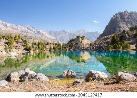 Scenic view on Alaudin lake in Fann moutains. The journey on beutiful places of Fann moutains in Tajikistan. 