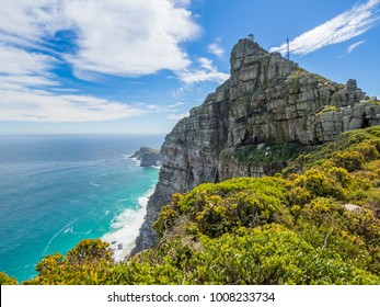 Scenic view on Cape Point with lighthouse, ocean and dramatic sky, Cape Town, South Africa - Shutterstock ID 1008233734