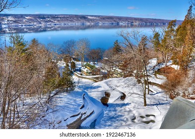 Scenic View On Lakeshore Of Seneca Lake, New York. Winter Landscape On A Sunny Calm Day. Waterfront Luxury Residential Buildings. Beautiful Landscape In Finger Lakes Region Of Upstate New York 