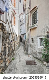 scenic view of a pathwalk in an adriatic town  - Shutterstock ID 2033516945