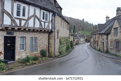 A Scenic View of Picturesque Houses on a Street in an English Village - Namely Castle Combe in Wiltshire England - Powered by Shutterstock