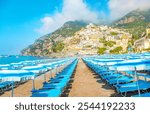 Scenic view of Positano beach on Amalfi Coast, Italy travel photo. Relaxing morning scene of most famous Italian resort and Spiaggia Grande beach.