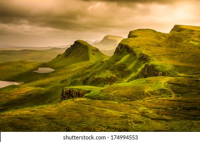 Scenic view of Quiraing mountains sunset with dramatic sky in Scottish highlands, Isle of Skye, United Kingdom - Powered by Shutterstock