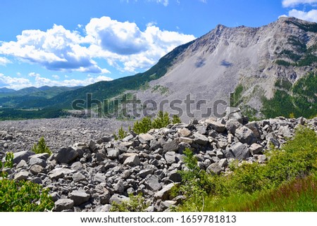 Scenic view of rockslide covered landscape and mountain at the Frank Slide during Summer Foto stock © 