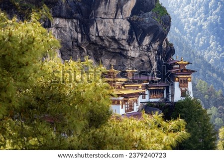 Scenic view of the sacred Paro Taktsang monastery (Tiger’s Nest buddhist temple) on the cliffside of Paro valley in Bhutan