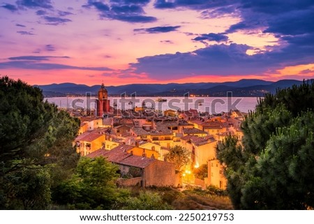 Scenic view of Saint Tropez at evening time against dramatic summer sun