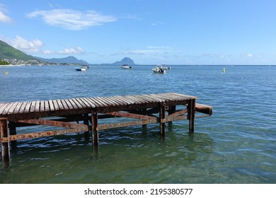 Scenic View Of A Seaside Pier On A Tropical Island