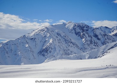 Scenic view of a snow-covered mountain on a beautiful winter day. Andes mountain range, Chile. - Powered by Shutterstock