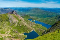 A Scenic View From The Summit Of Mount Snowdon On A Bright Sunny Day, Wales