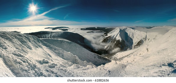 Scenic View Of Sun Shining Over Snow Covered Giant Mountains, Czech Republic.