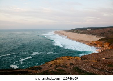 Scenic View Of Surf Beach And Ocean Near Nazare Portugal