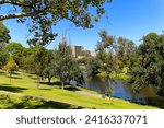 Scenic view of Torrens River at Elder Park with the university in the background at Australian City of Adelaide on a sunny summer day. Photo taken February 9th, 2012, Adelaide, Australia.