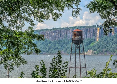 Scenic View Of Vintage Water Tower Overlooking The Hudson River In New York