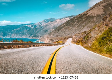 Scenic View Of World Famous Highway 1 With The Rugged Coastline Of Big Sur In Beautiful Golden Evening Light At Sunset In Summer, California Central Coast, USA