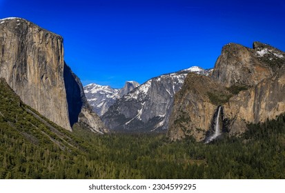 Scenic view of the Yosemite Valley from Tunnel View in the Yosemite National Park, Sierra Nevada mountains with snow in the spring in California, USA - Powered by Shutterstock
