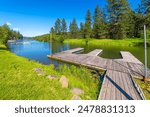 A scenic waterway with docks and public boat launch at Kidd Island Bay, one of the many bays and inlets along Lake Coeur d