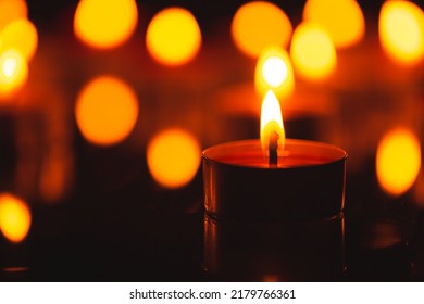 scented candle,scented candles on old wooden background,Symbol of eternal memory, mourning, minutes of silence, memorial day. The concept of loss and to the memory - Shutterstock ID 2179766361
