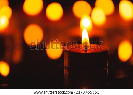 scented candle,scented candles on old wooden background,Symbol of eternal memory, mourning, minutes of silence, memorial day. The concept of loss and to the memory