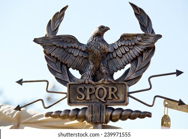 scepter with an eagle and the letters SPQR (Senatus Populus Romanus). Icon government of ancient Rome 