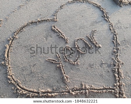 Scetching something on the beach