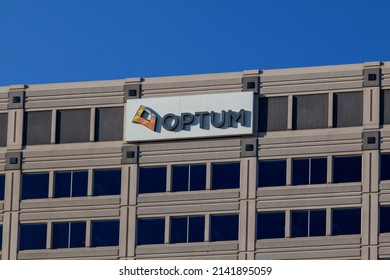 Schaumburg, Illinois, USA - March 27, 2022: Optum Sign On The Office Building. Optum, Inc. Is An American Pharmacy Benefit Manager And Health Care Provider.