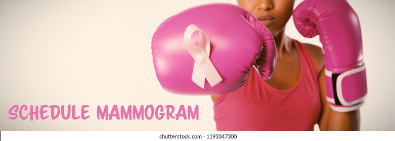 Schedule mammogram text with breast cancer awareness ribbon against woman for fight against breast cancer