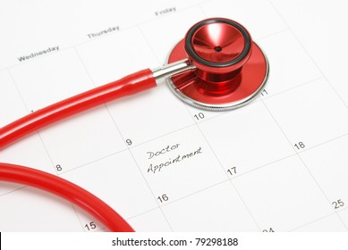 A Scheduled Doctors Appointment Is Wrote On A Calendar For A Patient Who Is In Need Of Their Services.