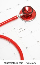 A Scheduled Doctors Appointment Is Wrote On A Calendar For A Patient Who Is In Need Of Their Services.