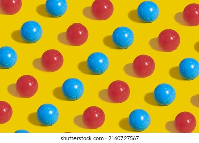 Scheme Of Plastic Red And Blue Ice Cream Balls On A Yellow Background. Ice Cream Container.