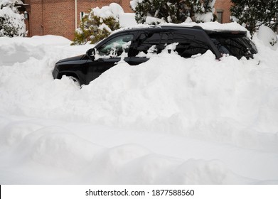 Schenectady, NY December 17, 2020 Vehicle Stuck In Snowbank On Impassable City Street