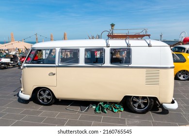 Scheveningen Beach, The Netherlands - May 22, 2012: White VW Kombi Camper Wagen And Silver Trailer At Aircooled Classic Car Show