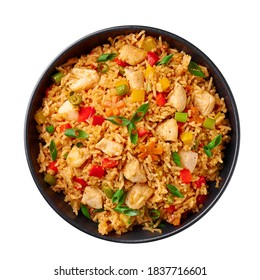 Schezwan Chicken Fried Rice in black bowl isolated on white background. Szechuan Rice is indo-chinese cuisine dish with bell peppers, green beans, carrot, chicken breasts. Top view