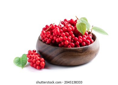 Schisandra  Chinensis Berries In Wooden Bowl Isolated On White 