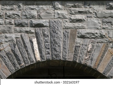 Schist Stone Quoining over Arched Doorway