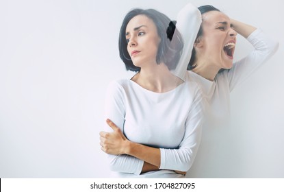 Schizophrenia. Close-up photo of a young beautiful sad woman suffering from multiple personality disorders. Double exposure. - Shutterstock ID 1704827095