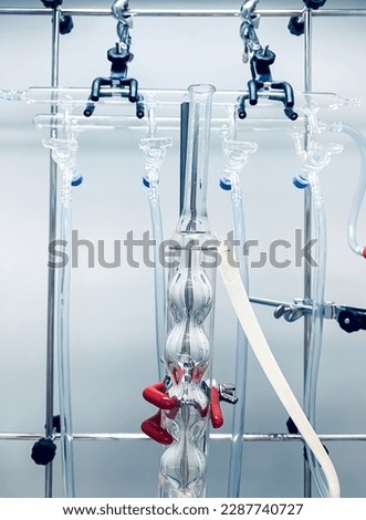 The Schlenk line (vacuum gas manifold) - a chemistry apparatus developed that consists of a dual manifold with several ports. It is useful for manipulating moisture- and air-sensitive compounds.