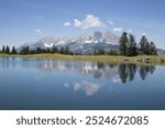 Schlossbergsee at Harschbichl, behind Wilder Kaiser, Kaisergebirge, Alps, Tyrol, Austria, Europe