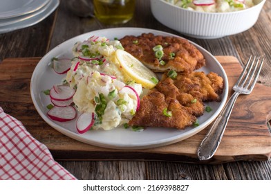 Schnitzel With Potato Salad. Traditional German, Bavarian Dish